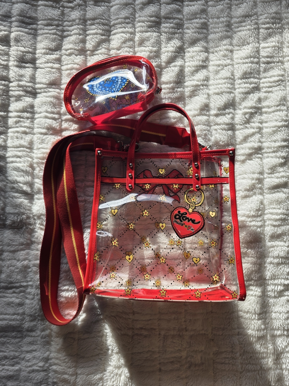 Brighton Clear Tote with Red Trim and Gold Heart Accents